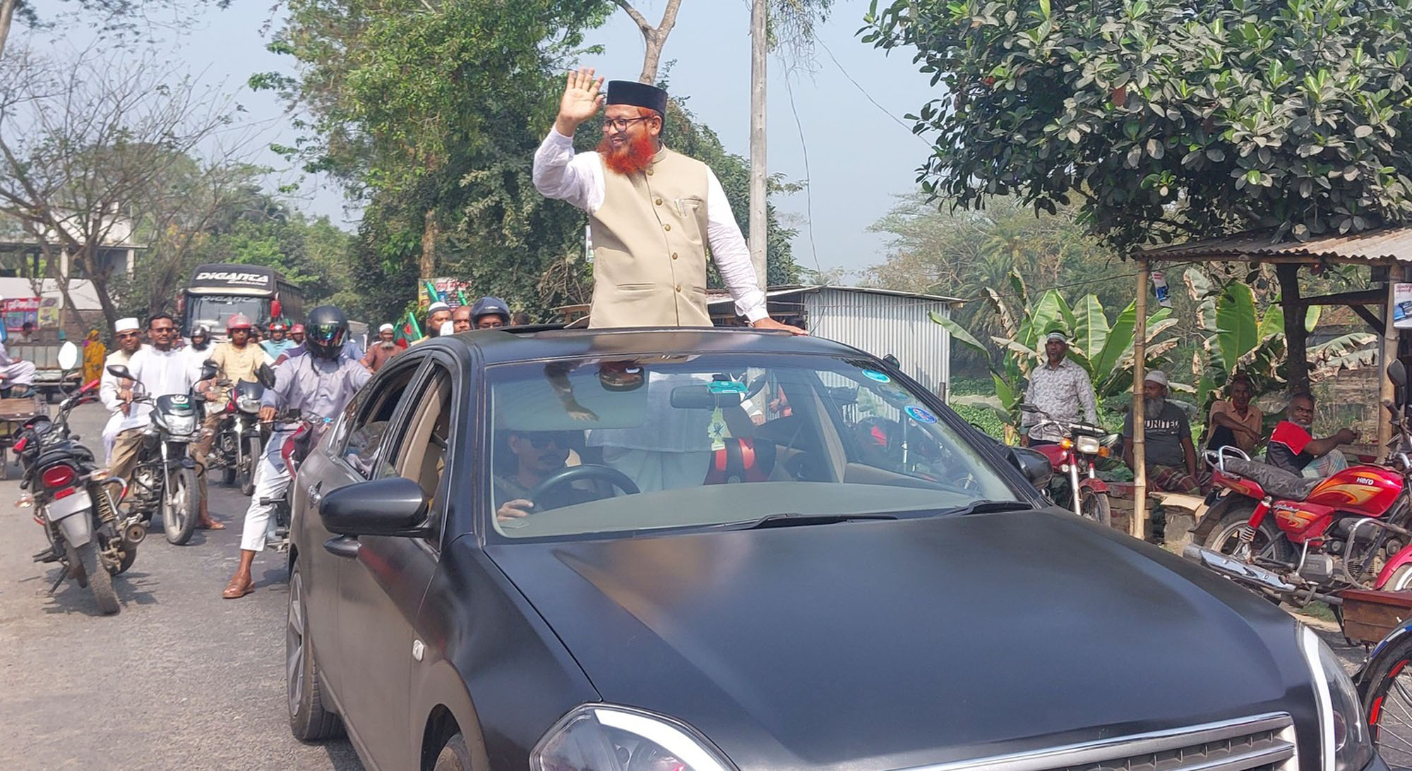 কোটালীপাড়ায় জামায়াতে ইসলামীর মনোনীত প্রার্থী রেজাউল করিমের শোভাযাত্রা